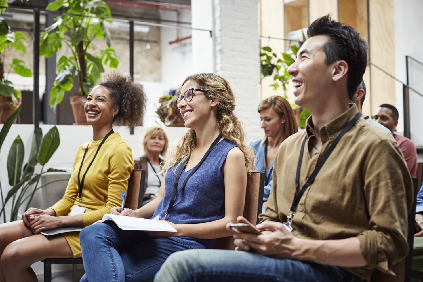 Employees engaging in presentation.