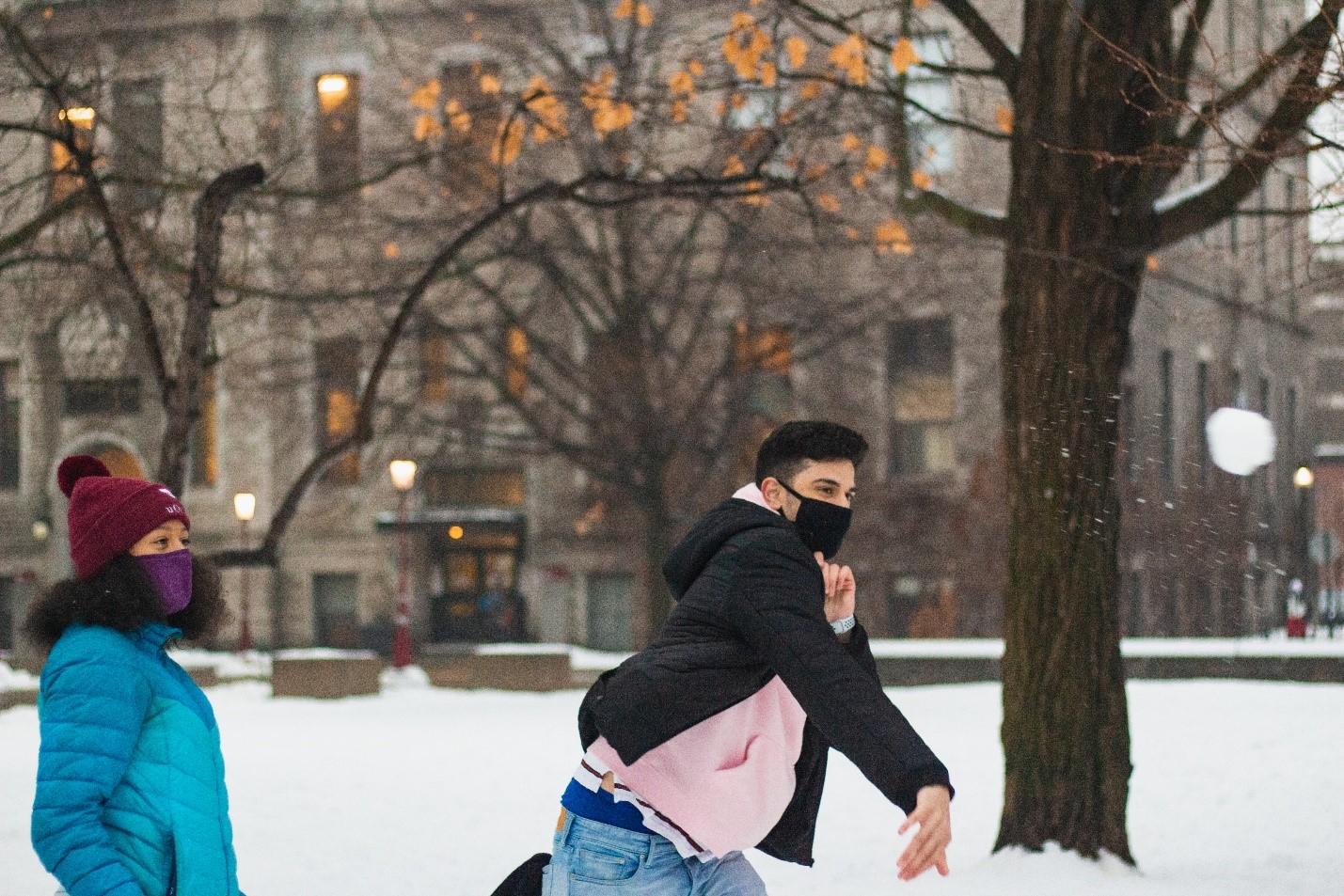 Student throwing a snow ball