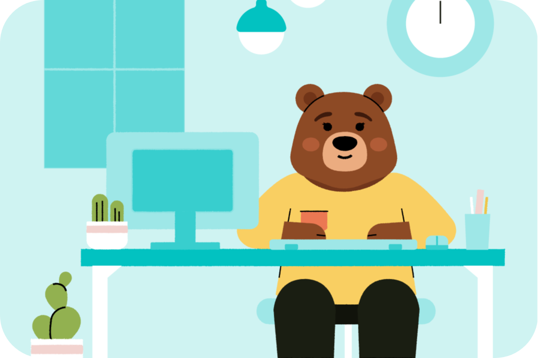 bear wellness character sitting at the desk
