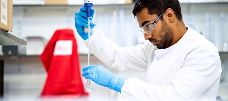 Chemist working in lab.