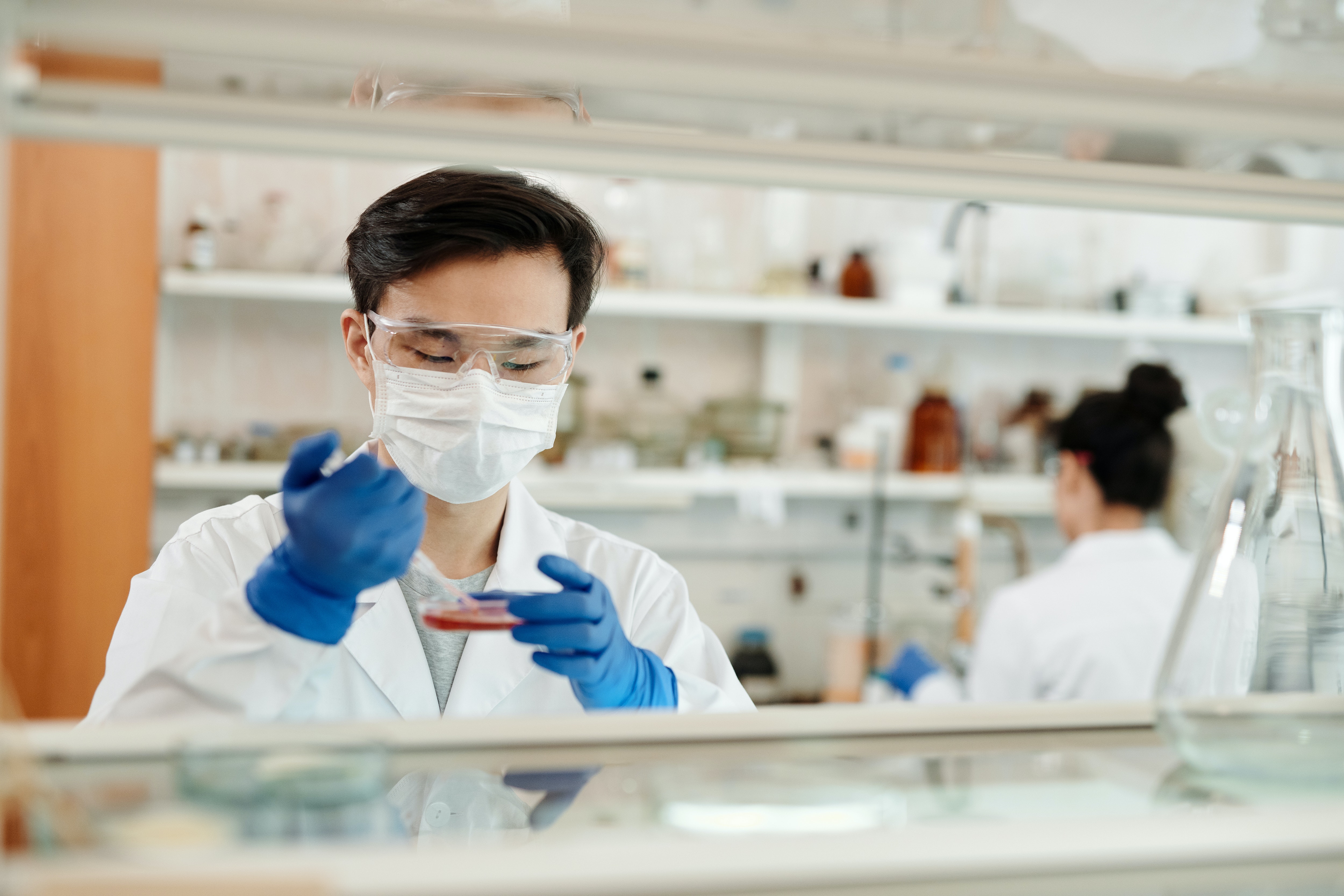 Student in chemical engineering lab.
