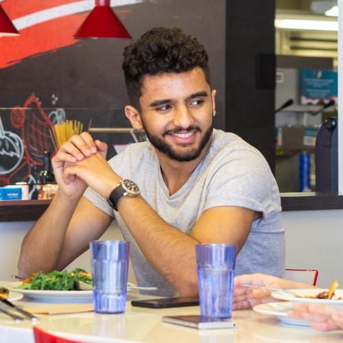 Students eating together in a cafeteria
