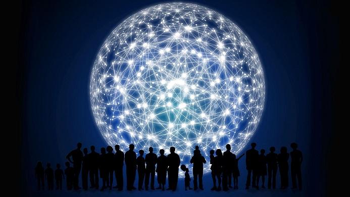 shadows of people in front of a luminous ball