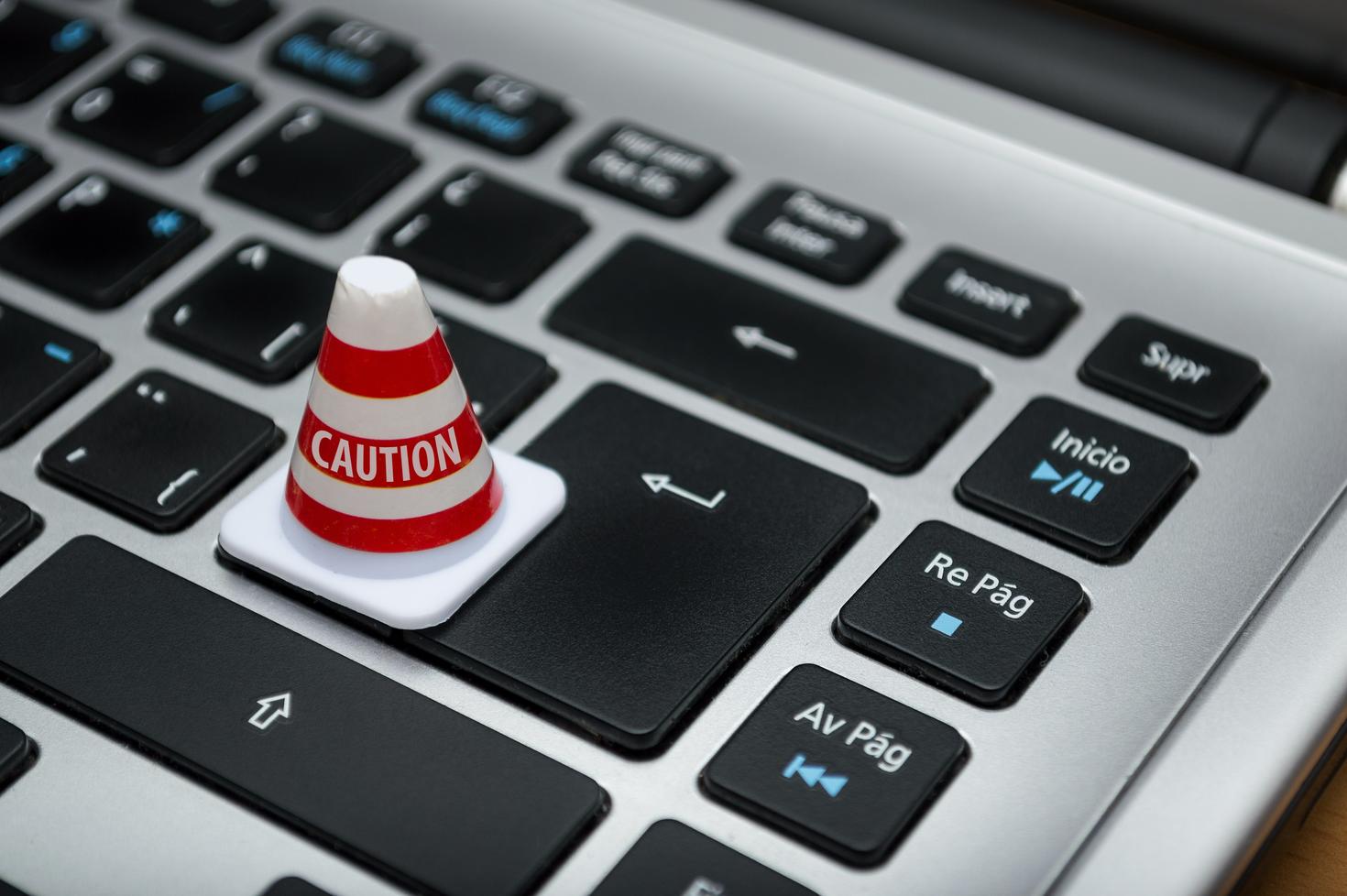 Cône d'avertissement sur la touche "Entrée" du clavier